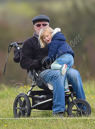 mischievous Mia Tindall plays with elderly family friend