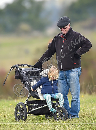mischievous Mia Tindall plays with elderly family friend