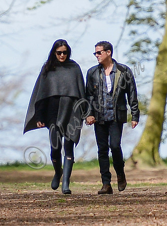 Liv Tyler and Dave Gardner strolling in the woods hand in hand at Badbury Clump