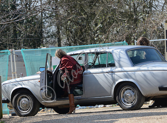Kate Moss gets into  Rolls Royce wearing  patterned blanket wrap