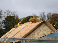 master thatcher at work
