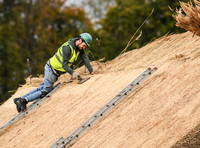 master thatcher at work