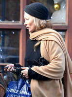 Kate Moss black turban hat and camel scarf
