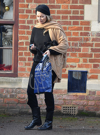 Kate Moss black turban hat and camel scarf