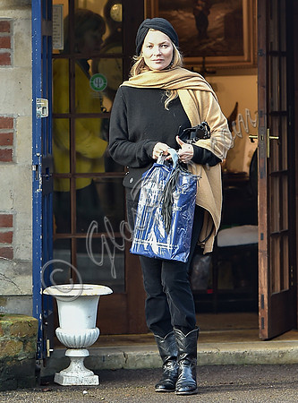 Kate Moss black turban hat and camel scarf