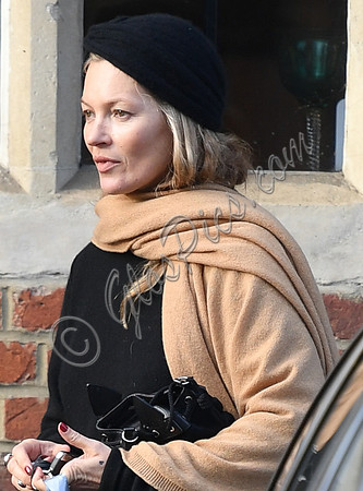 Kate Moss black turban hat and camel scarf