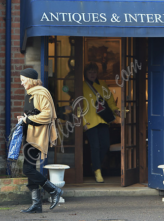 Kate Moss black turban hat and camel scarf