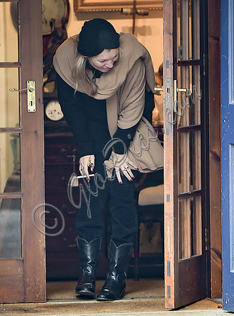 Kate Moss black turban hat and camel scarf, guiles