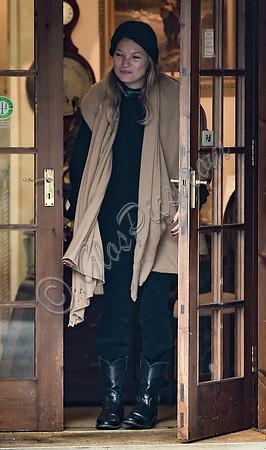Kate Moss black turban hat and camel scarf