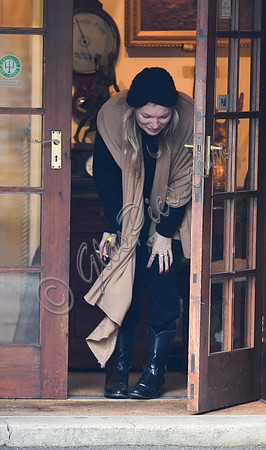 Kate Moss black turban hat and camel scarf, guiles