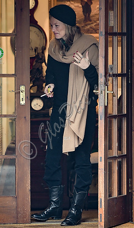 Kate Moss black turban hat and camel scarf, guiles