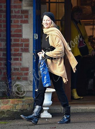 Kate Moss black turban hat and camel scarf
