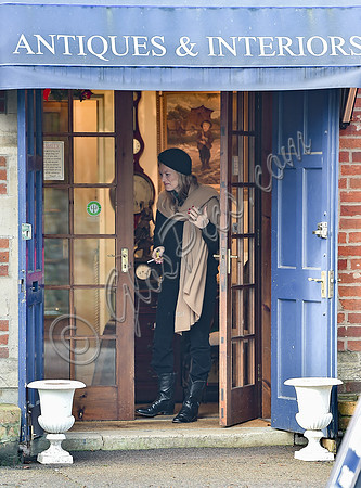 Kate Moss black turban hat and camel scarf, guiles