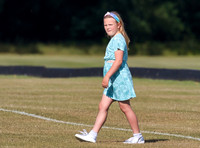 Mia Tindall wearing turquoise sun dress