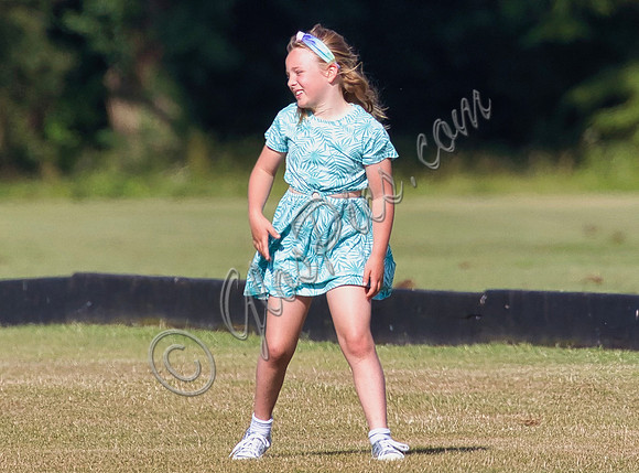 Mia Tindall wearing turquoise sun dress