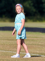Mia Tindall wearing turquoise sun dress