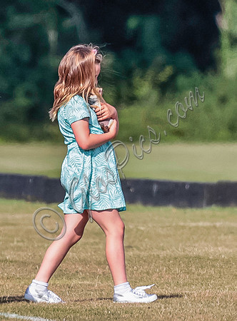 Mia Tindall wearing turquoise sun dress