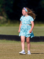 Mia Tindall wearing turquoise sun dress