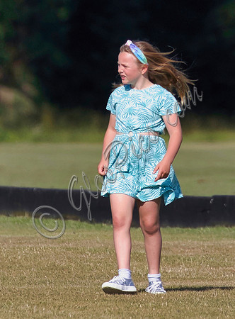 Mia Tindall wearing turquoise sun dress