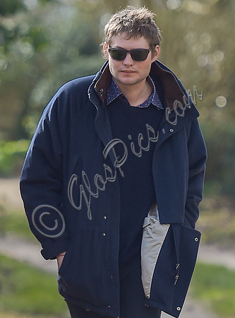 Nikolai von Bismarck wearing navy peacoat and sunglasses