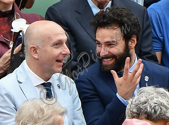 Aidan Turner and Richard Cook sat in stands
