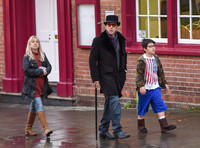 Nicolas Cage morphs Dickens and Willy Wonka shopping with Kal-El and housekeeper.