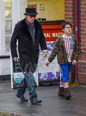 Nicolas Cage morphs Dickens and Willy Wonka shopping with Kal-El