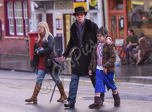 Nicolas Cage morphs Dickens and Willy Wonka shopping with Kal-El and housekeeper.