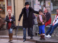 Nicolas Cage morphs Dickens and Willy Wonka shopping with Kal-El and housekeeper.