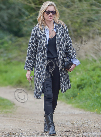 Kate Moss wearing Gucci mohair animal print overcoat