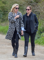 Kate Moss wearing Gucci mohair animal print overcoat with one other female
