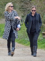 Kate Moss wearing Gucci mohair animal print overcoat with one other female