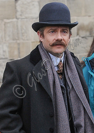 Head shot of Martin Freeman in period attire for Sherlock filming