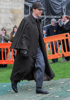 Benedict Cumberbatch in caped coat and deerstalker