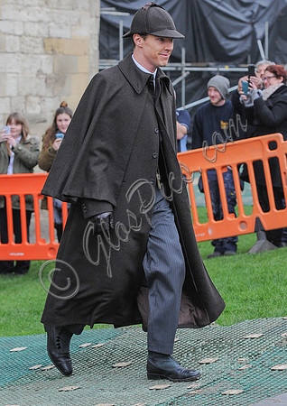 Benedict Cumberbatch in caped coat and deerstalker