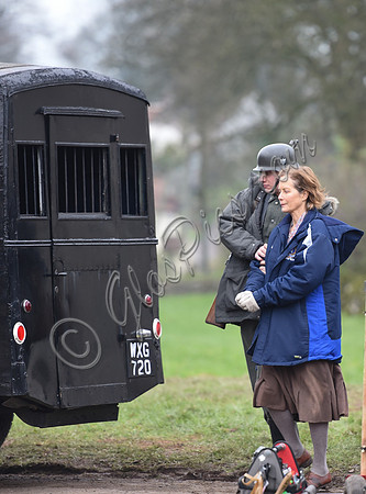 Jenny Seagrove and german soldier at rear of black maria