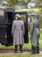 Nazi soldiers at the rear of a Black Maria