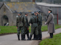 A group Nazi soldiers and an officer