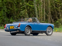 Kate Moss and Nikolai von Bismarck in blue MG Midget