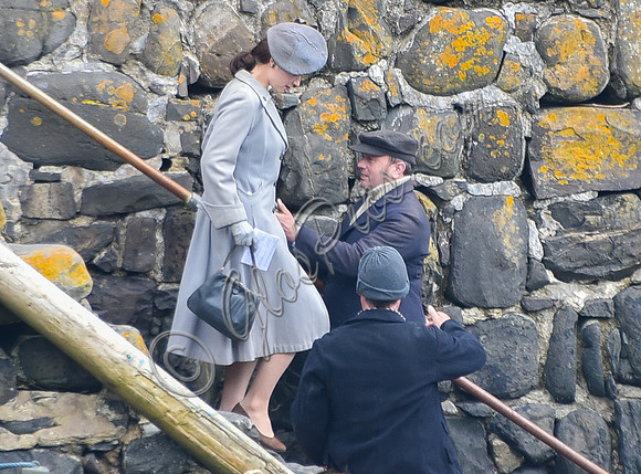 Lily James filming scenes from "Guernsey" at Clovelly Harbour
