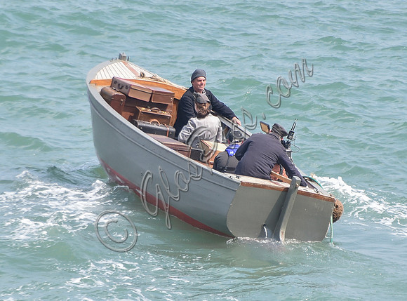 Lily James filming scenes from "Guernsey" at Clovelly Harbour