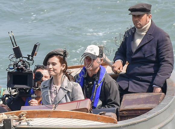 Lily James and Mike Newell filming scenes from "Guernsey" at Clovelly Harbour