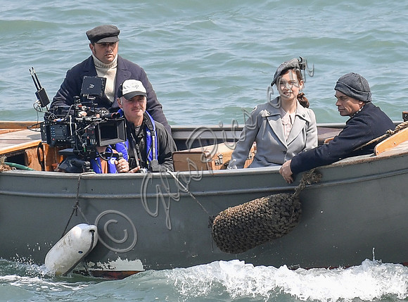 Lily James and Mike Newell filming scenes from "Guernsey" at Clovelly Harbour
