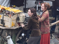 Lily James and Katherine Parkinson filming a scene for WWII drama  "Guernsey" at Clovelly Harbour