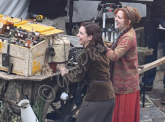 Lily James and Katherine Parkinson filming a scene for WWII drama  "Guernsey" at Clovelly Harbour
