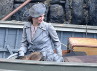 Lily James filming scenes from "Guernsey" at Clovelly Harbour
