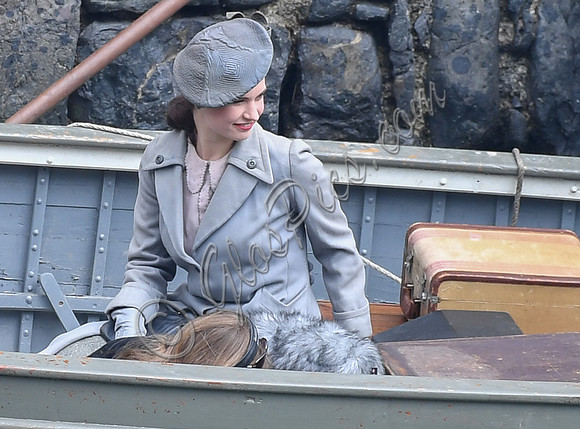Lily James filming scenes from "Guernsey" at Clovelly Harbour