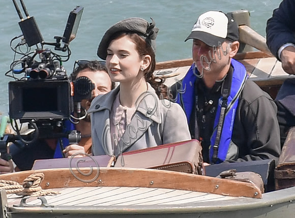 Lily James and Mike Newell filming scenes from "Guernsey" at Clovelly Harbour