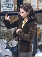 Lily James filming scenes from "Guernsey" at Clovelly Harbour