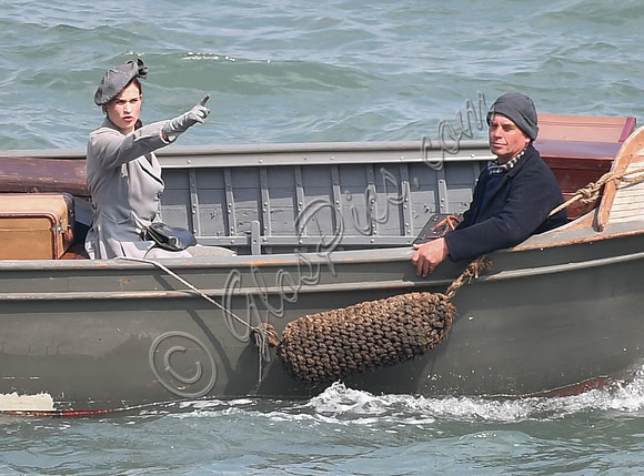 Lily James filming scenes from "Guernsey" at Clovelly Harbour